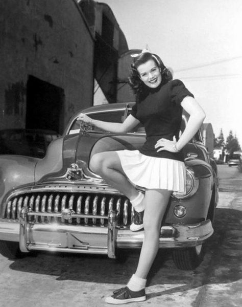 Women Hanging Around Buicks