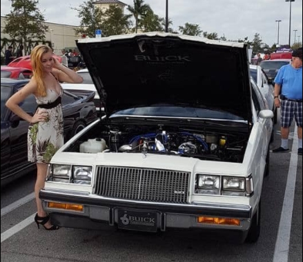 Women Hanging Around Buicks