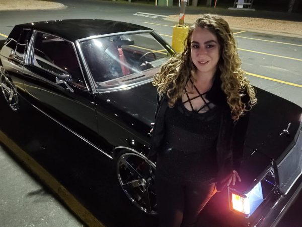 Women Hanging Around Buicks